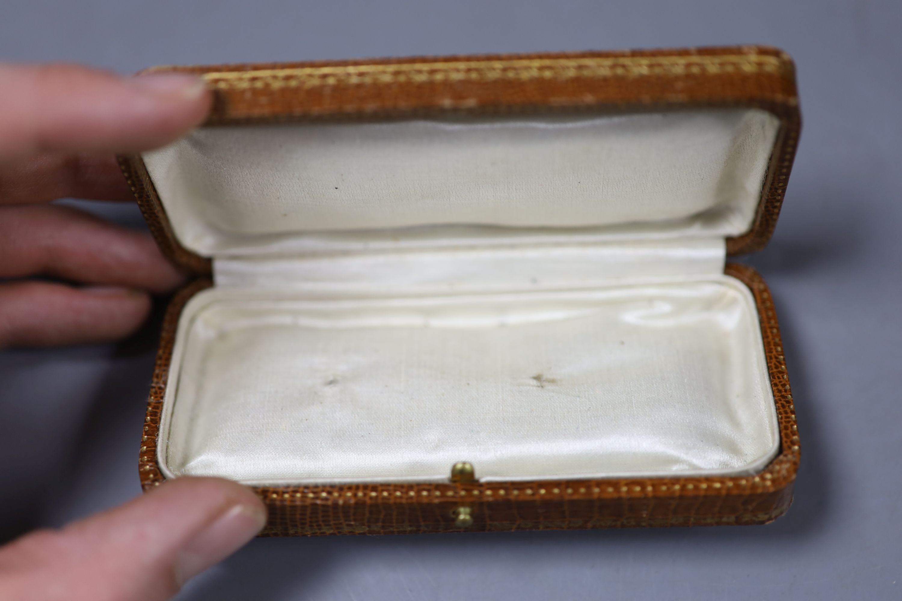 Five assorted boxes including two crocodile skin boxes by Finnigans, early 20th century, largest 13cm